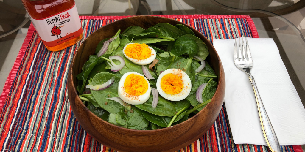 SPINACH SALAD WITH TANGY HOT BACON DRESSING